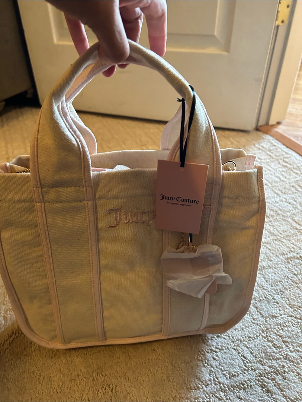 NWT JUICY COUTURE tote bag with charm.